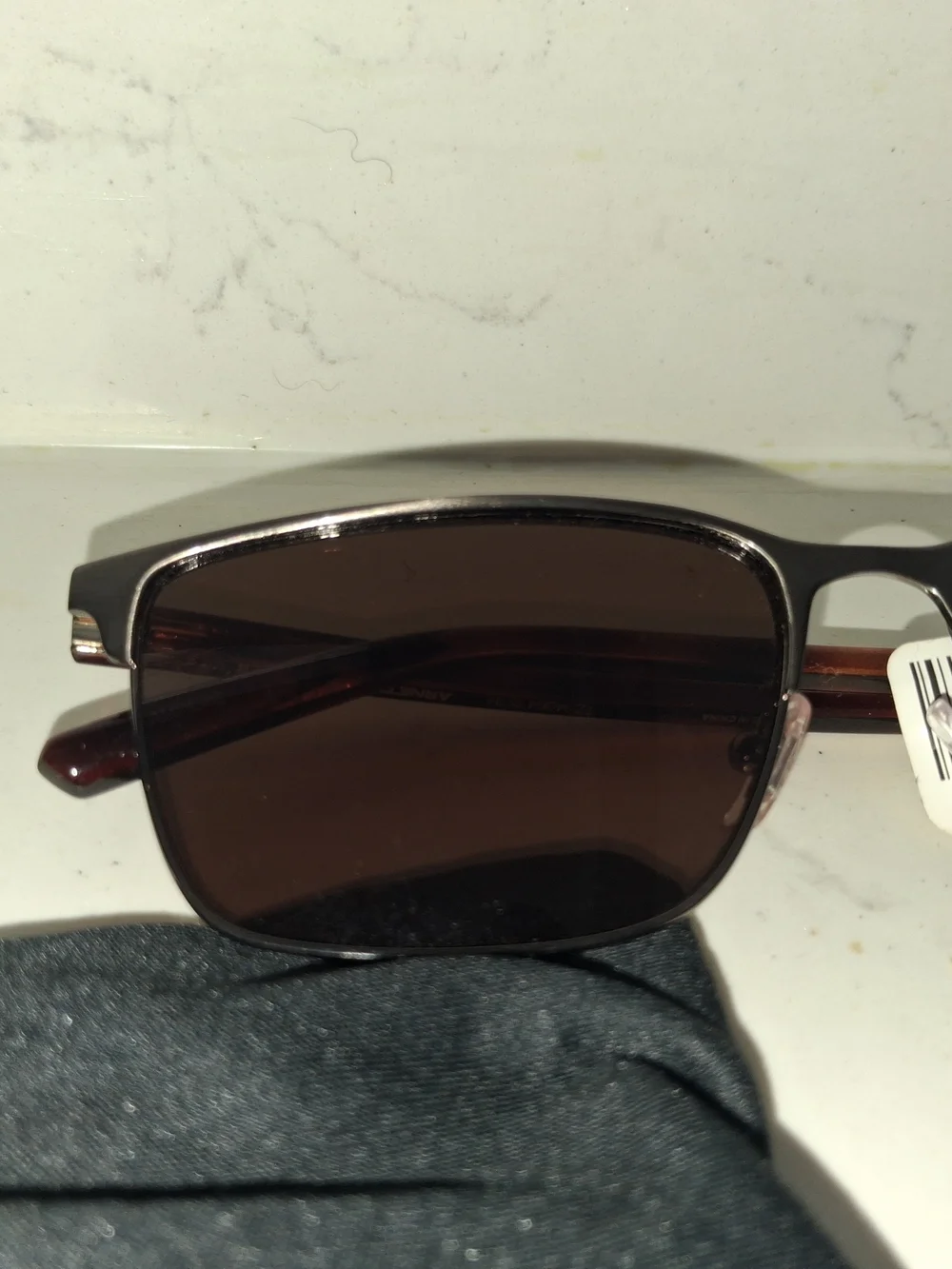 Arnette Hampere AN3094 rectangle sunglasses featuring a brushed gunmetal frame